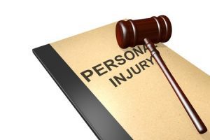 Personal injury written a legal pad.