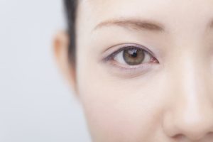 A close up image of a woman's eye to represent our guide on compensation for loss of sight in one eye