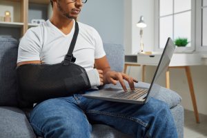A man has broken his arm whilst on an all inclusive package holiday and is looking into his holiday contract.
