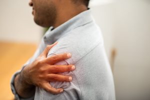 A man has injured his shoulder abroad and is now thinking of looking into package holiday claims and beginning the legal process.